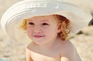 Always have baby wear a had to shade her face in addition to sunscreen in babies over 6 months