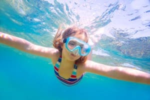 Look how the sun hits your body while swimming and playing...